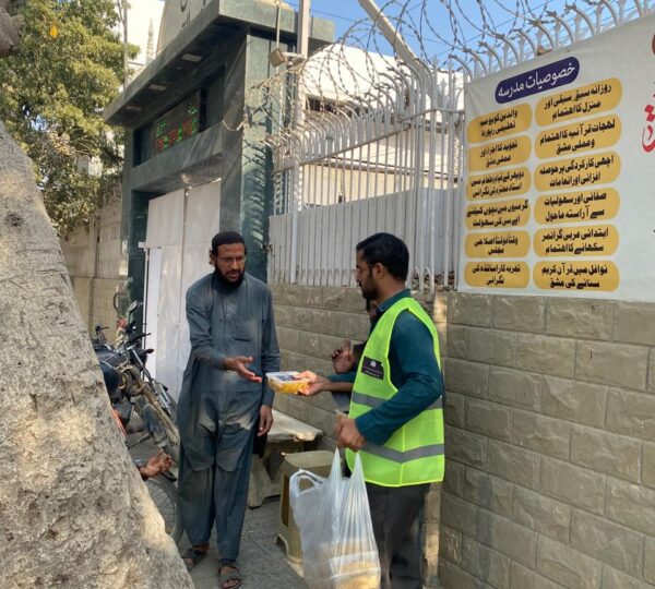 Team members delivering food and support packages to people living in vulnerable conditions